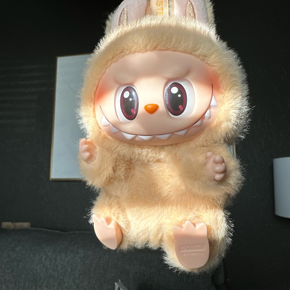 Labubu have a seat plush pendant